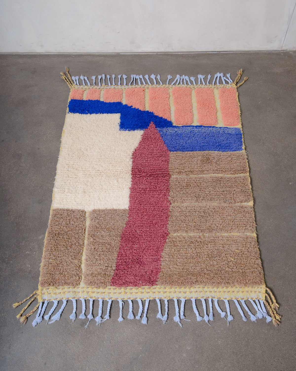 Modern, designer, handcrafted Berber rug from Morocco. Beniourain carpet with beautiful colours and patterns and fluffy wool texture.